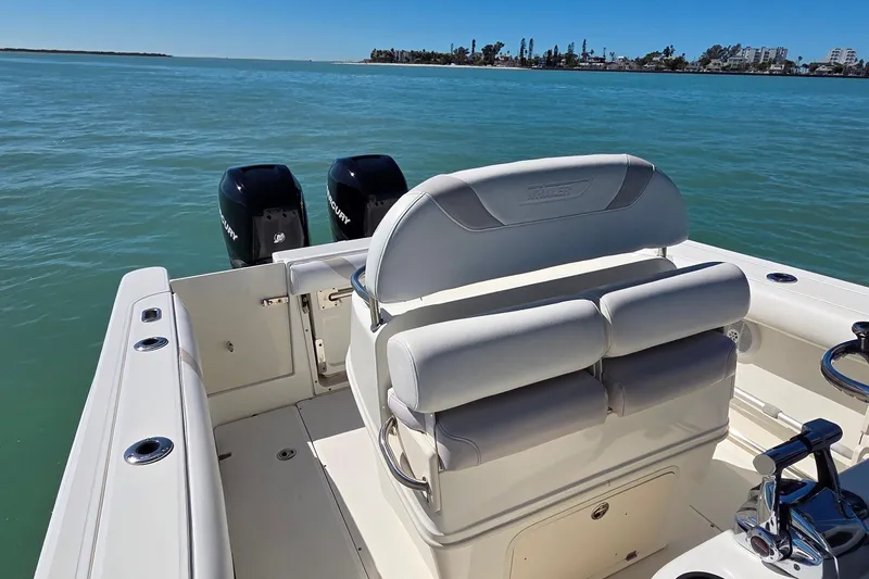 Slide: The Image of 2006 Boston Whaler 270 Outrage boat with dual Mercury engines on calm water. - 33