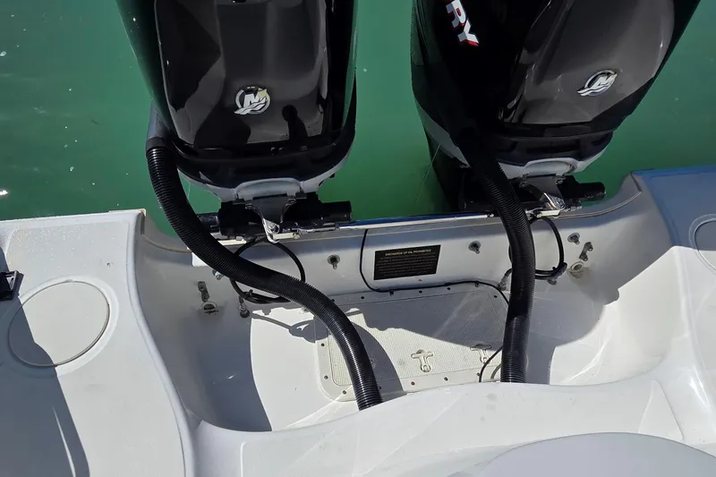 Slide: The Image of 2006 Boston Whaler 270 Outrage boat with dual Mercury outboard engines. - 37