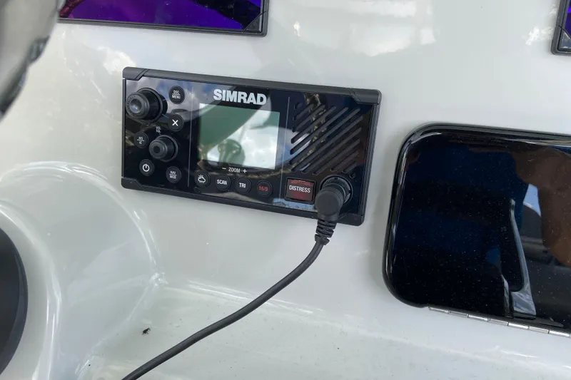 Slide: The Image of Simrad marine electronics on 2025 Boston Whaler 280 Outrage dashboard. - 40