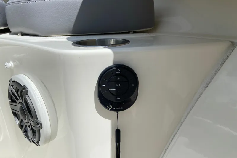 Slide: The Image of 2025 Boston Whaler 280 Outrage audio controls and speaker detail. - 62