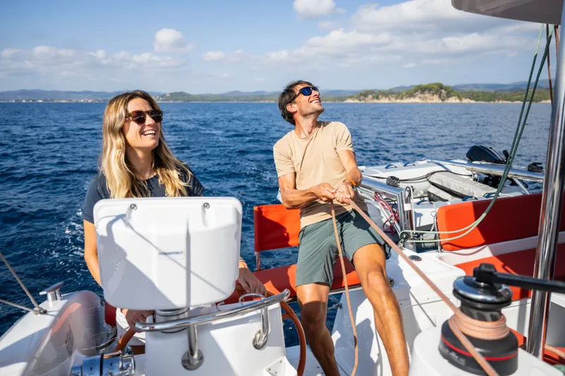 Slide: The Image of Couple sailing on Excess 11 catamaran, sunny day, 2026. - 5