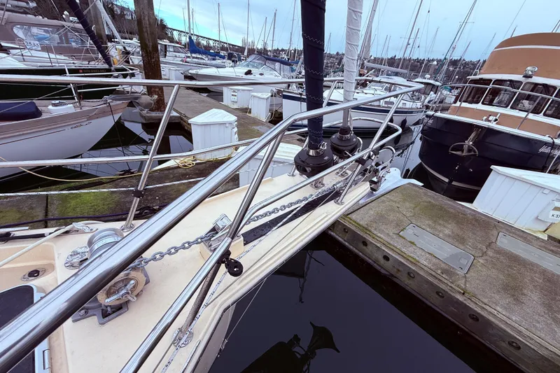 Slide: The Image of Docked 2025 Island Packet 349 sailboat with stainless steel railings and anchor chain. - 4