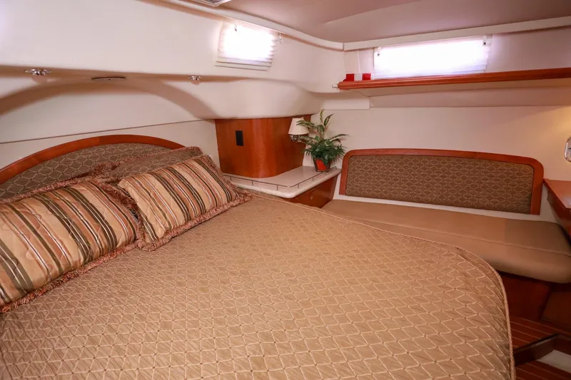 Slide: The Image of Luxurious cabin interior of 2009 Hunter 45 Center Cockpit yacht with cozy bedding. - 30