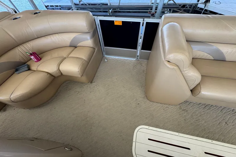 Slide: The Image of Steering console of 2011 Crest 250SLR Caribbean boat with wood accents and gauges. - 10