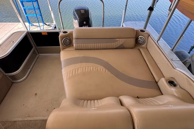 Slide: The Image of Dashboard of a 2011 Crest 250SLR Caribbean with gauges and Humminbird GPS. - 12