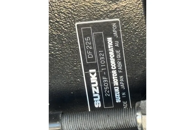 Slide: The Image of 2011 Crest 250SLR Caribbean pontoon boat hulls above water in dock. - 26