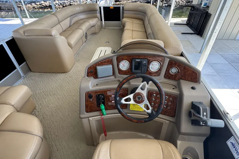 Slide: The Image of 2011 Crest 250SLR Caribbean pontoon boat with sleek aluminum railings and modern design. - 3