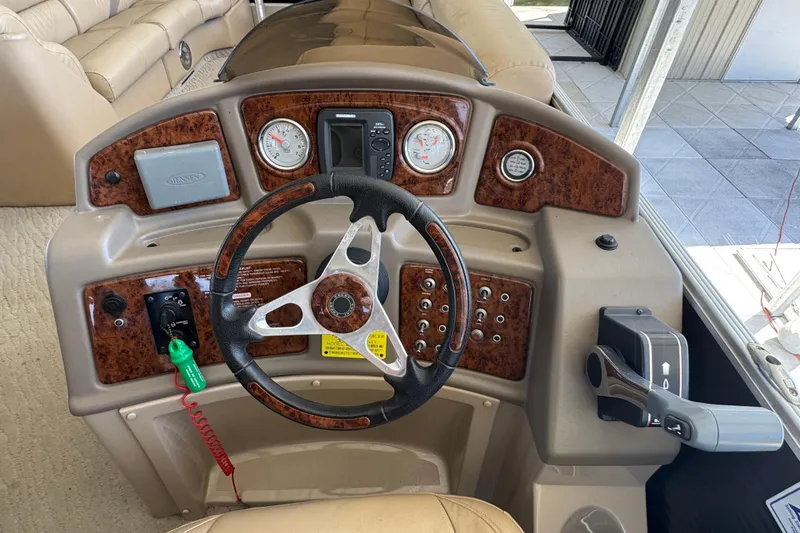 Slide: The Image of Crest 250 SLR Caribbean 2011 with Suzuki outboard motor at dockside. - 5