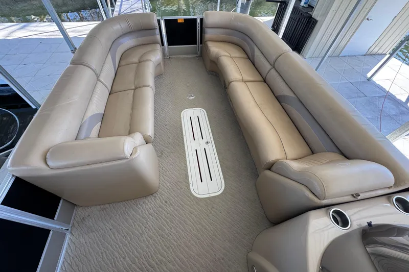 Slide: The Image of 2011 Crest 250SLR Caribbean logo on a sleek black and silver surface. - 7