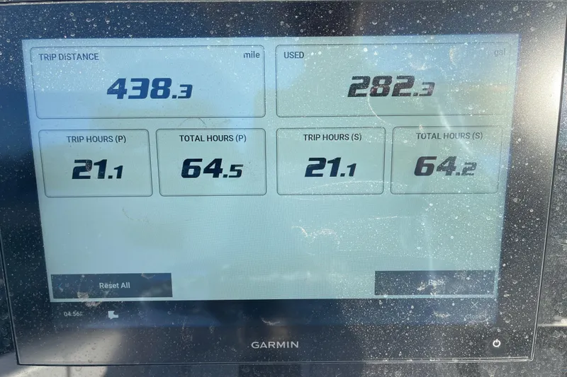 Slide: The Image of Garmin display showing trip data for 2025 Sportsman Heritage 261 Center Console boat. - 23