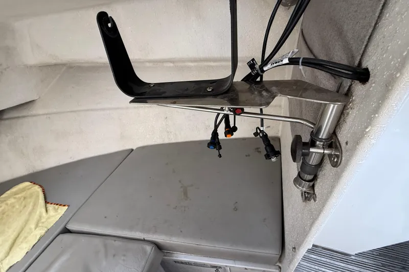 Slide: The Image of Interior view of a 1999 SeaSport Seamaster 2700 boat with mounted equipment. - 17