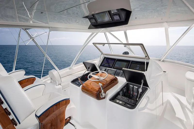 Slide: The Image of Manufacturer Provided Image: Luxurious helm of 2026 Viking 58 Convertible yacht with ocean view. - 5