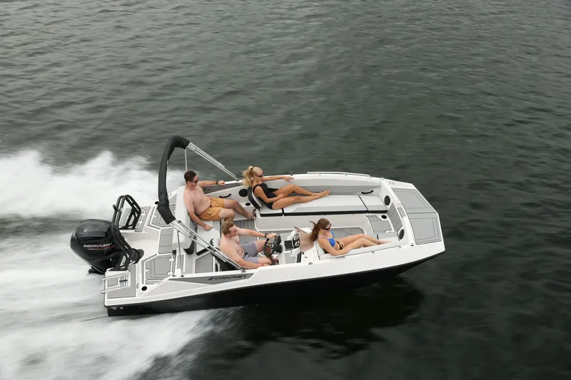 The Image of Starcraft 181SVOB 2026 boat on water with passengers. - 0
