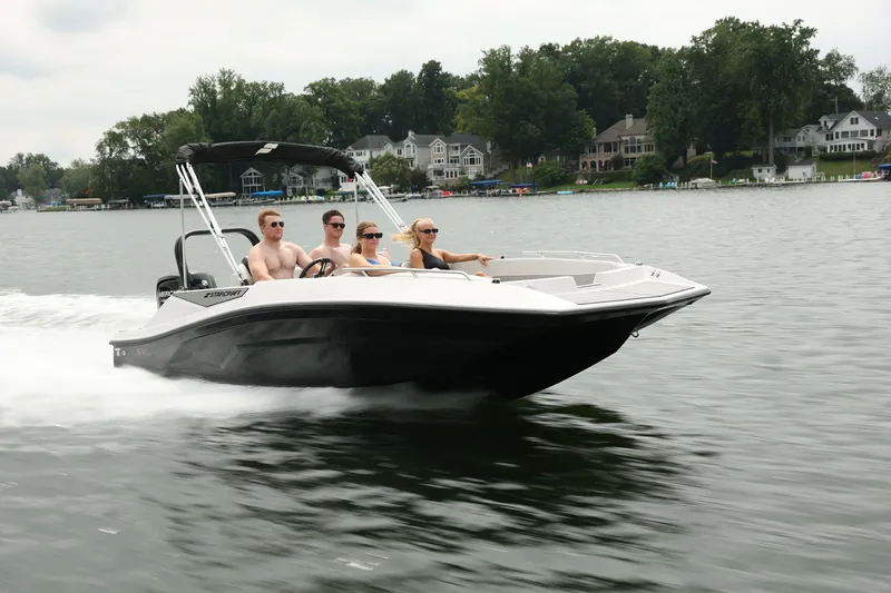 Slide: The Image of Starcraft 181SVOB 2026 boat on a lake with four people. - 3