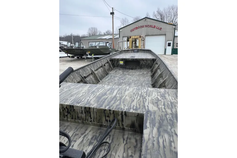 Slide: The Image of 2026 SeaArk 1648 MV Special boat with camouflage design at Outdoor World LLC. - 5