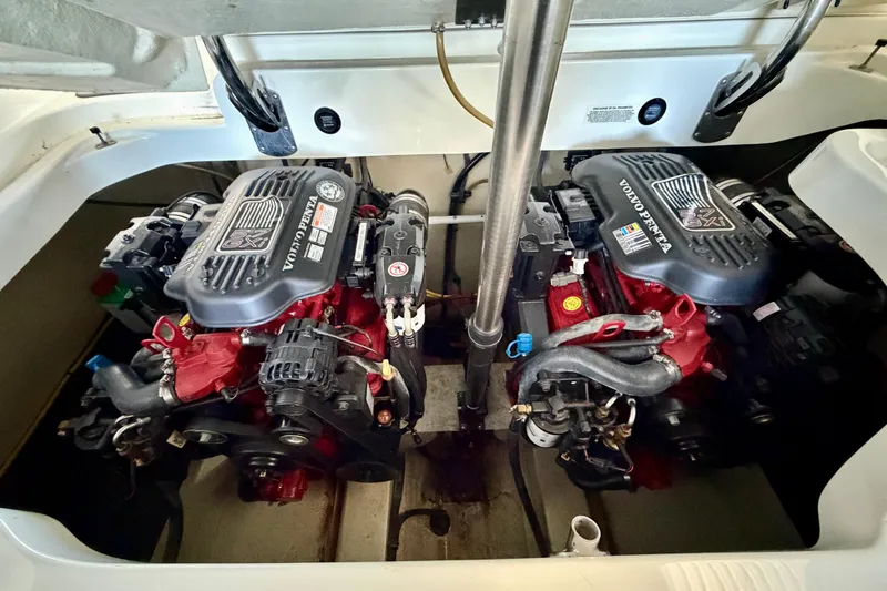 Slide: The Image of Twin Volvo Penta engines in a 2007 Cobalt 302 boat engine compartment. - 46