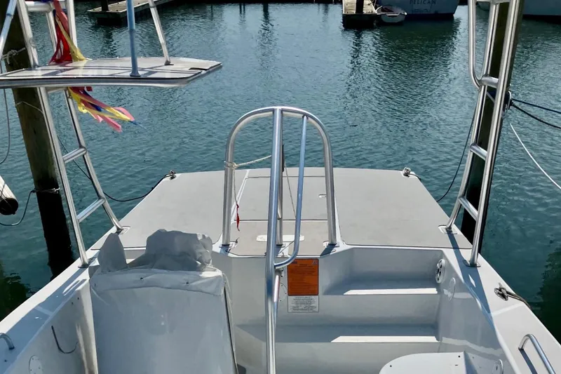 Slide: The Image of Parasailing boat docked at marina, O.C. Parasail 28, 2003 model. - 14