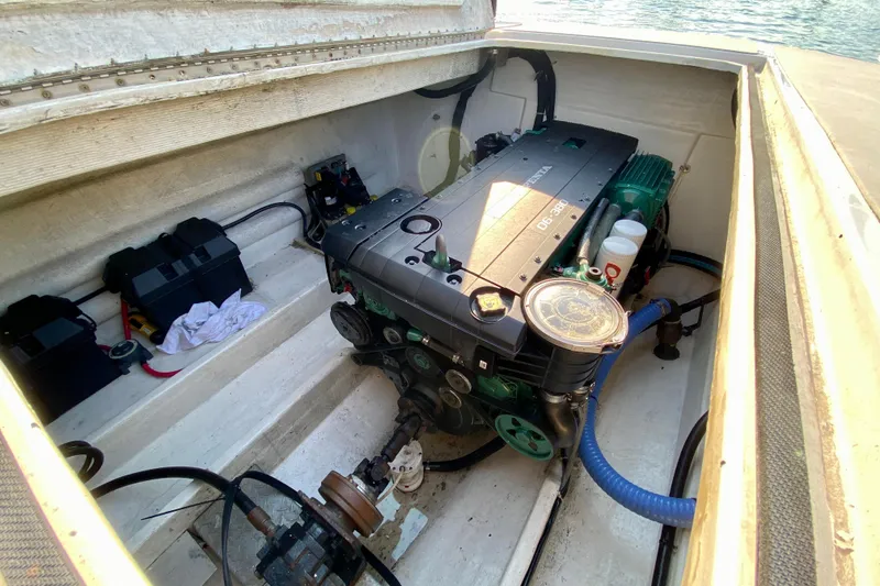 Slide: The Image of Engine compartment of 2003 Custom O.C. Parasail 28 boat, featuring Volvo Penta engine. - 19