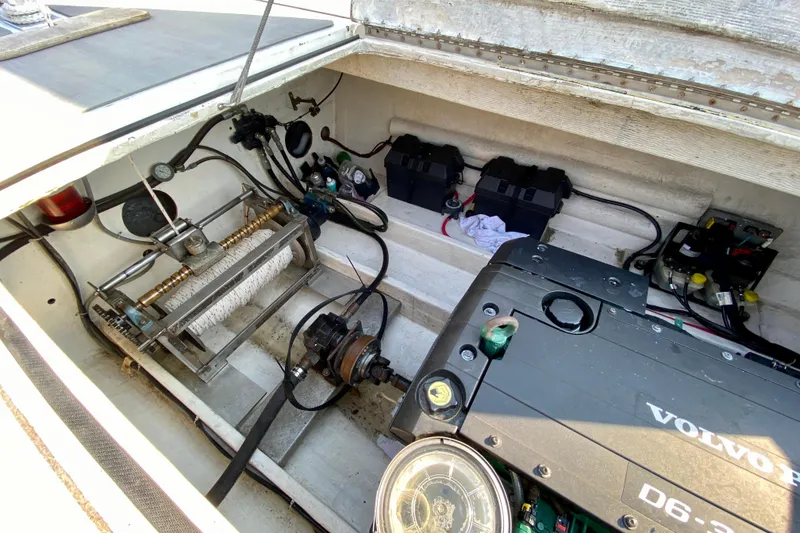 Slide: The Image of Engine compartment of 2003 Custom O.C. Parasail 28 with Volvo D6 engine and equipment. - 23