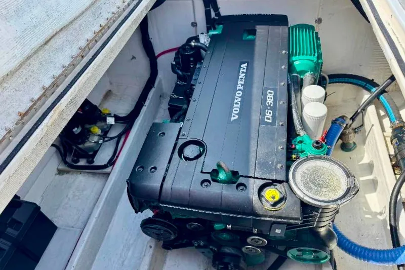 Slide: The Image of Volvo Penta engine in 2003 O.C. Parasail 28 boat, showcasing mechanical components. - 16