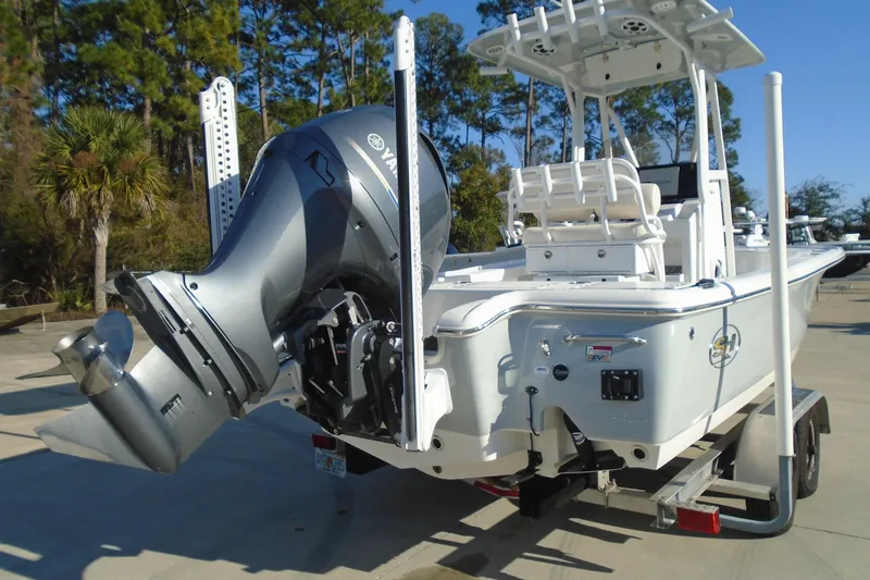 Slide: The Image of 2023 Sea Hunt BX 22 BR boat with Yamaha outboard engine on trailer. - 8