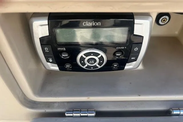 Slide: The Image of Clarion CMS1 stereo system in a 2013 South Bay 722RS boat console. - 17