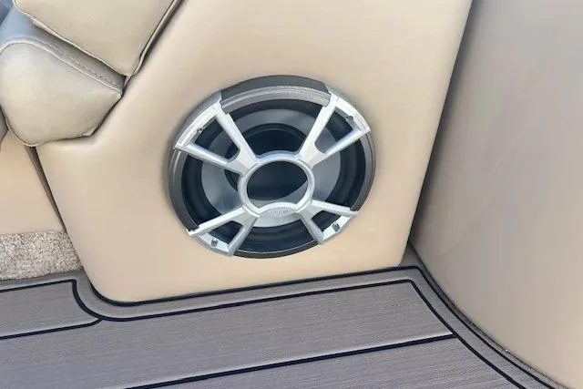 Slide: The Image of Speaker installed on a 2013 South Bay 722RS boat with beige interior. - 18