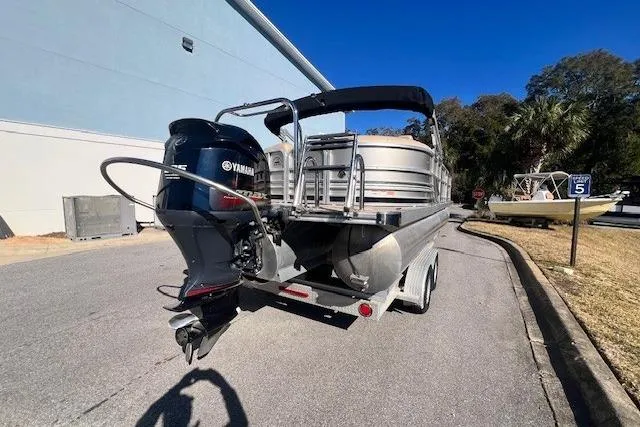 Slide: The Image of 2013 South Bay 722RS pontoon boat with Yamaha outboard motor on a trailer. - 5