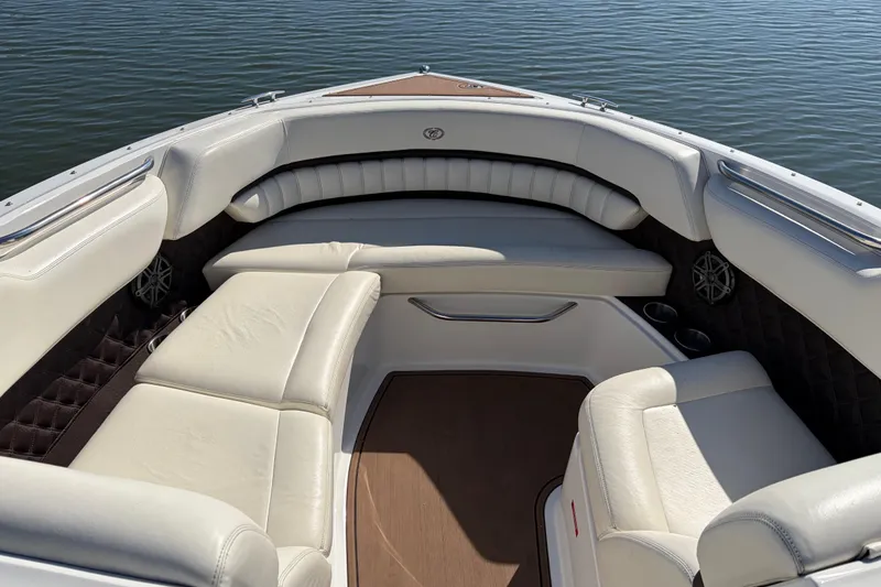 Slide: The Image of Luxurious seating on 2012 Cobalt A28 boat, featuring white leather upholstery and elegant design. - 20
