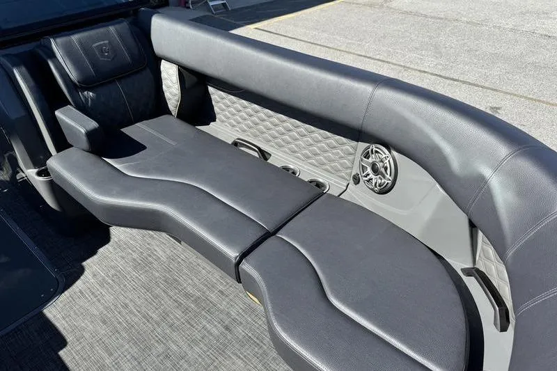 Slide: The Image of Luxurious seating on 2026 Godfrey Sanpan 2700 ULW pontoon boat with quilted design and speaker. - 15