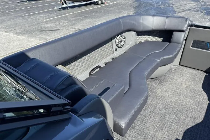 Slide: The Image of Luxurious seating on 2026 Godfrey Sanpan 2700 ULW pontoon boat, featuring sleek design. - 16