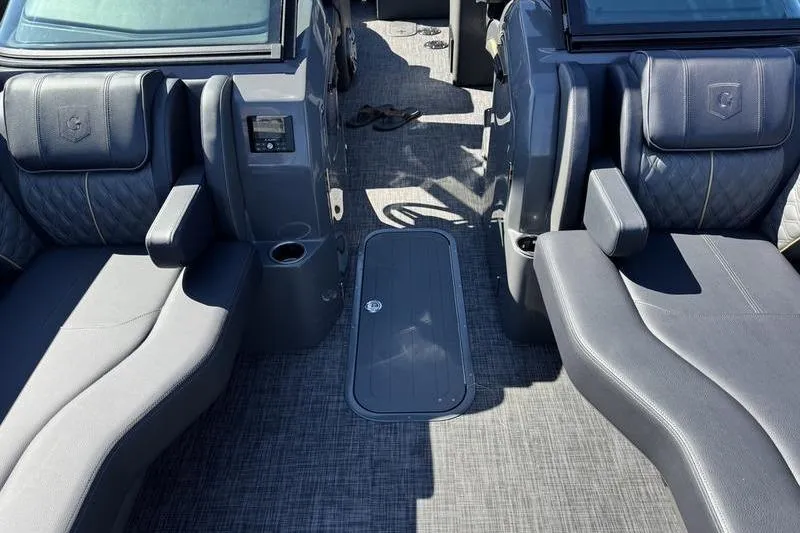 Slide: The Image of Luxurious seating on 2026 Godfrey Sanpan 2700 ULW pontoon boat interior. - 18