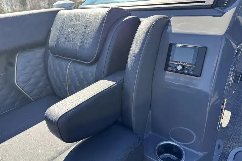 Slide: The Image of Luxurious seating on 2026 Godfrey Sanpan 2700 ULW with control panel and cup holder. - 21