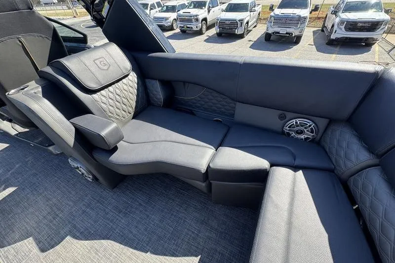 Slide: The Image of Luxurious seating on 2026 Godfrey Sanpan 2700 ULW pontoon boat, featuring quilted upholstery. - 27