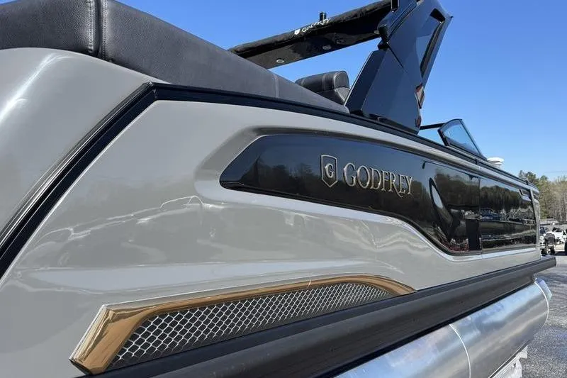 Slide: The Image of 2026 Godfrey Sanpan 2700 ULW pontoon boat, sleek design, side view. - 8