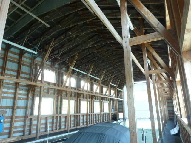 Slide: The Image of Interior of custom boathouse with wooden structure, built in 2015. - 9