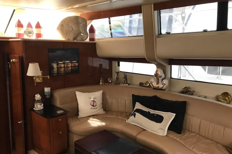 Slide: The Image of Luxurious interior of 2006 Meridian 408 Motoryacht with elegant decor and comfortable seating. - 17