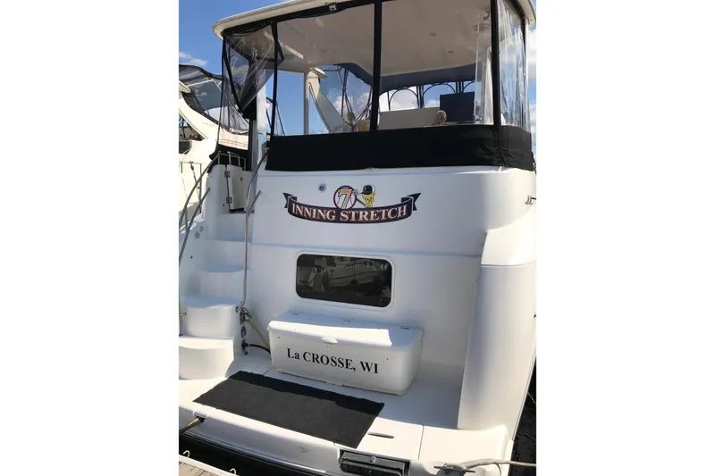 Slide: The Image of 2006 Meridian 408 Motoryacht docked, named "Inning Stretch," La Crosse, WI. - 6