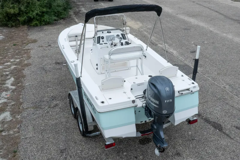 Slide: The Image of 2017 Robalo 206 Cayman boat with Yamaha 115 engine on trailer. - 12