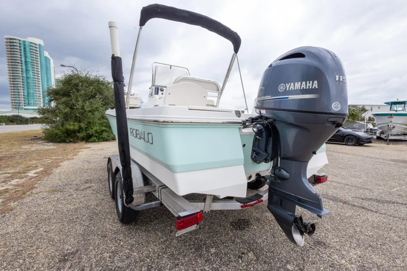 Slide: The Image of 2017 Robalo 206 Cayman boat with Yamaha outboard motor on a trailer. - 19