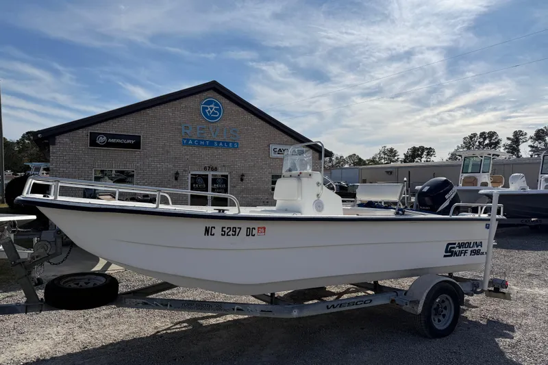 Slide: The Image of 2006 Carolina Skiff 1980 DLX boat on trailer at Revis Yacht Sales. - 4