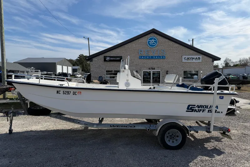 Slide: The Image of 2006 Carolina Skiff 1980 DLX boat on trailer at Revis Yacht Sales. - 5