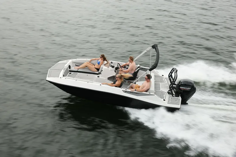 Slide: The Image of Starcraft 181SVOB 2026 boat cruising on water with passengers. - 2