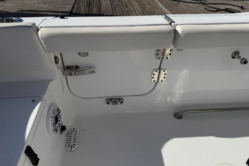 Slide: The Image of Interior view of 2025 Sea Hunt Ultra 255 SE boat, featuring seating and hardware details. - 37