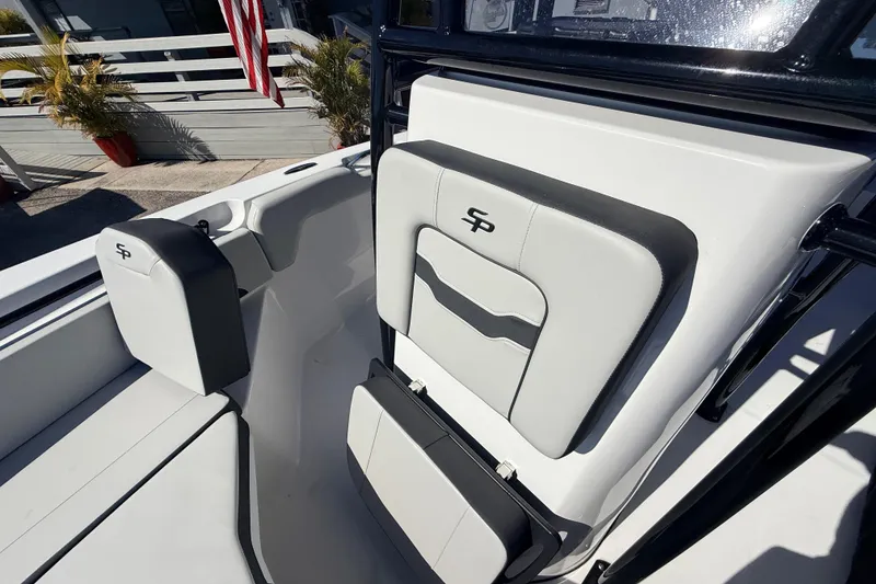 Slide: The Image of 2025 Sea Pro 225FLX Sandbar boat interior with stylish seating and modern design. - 23