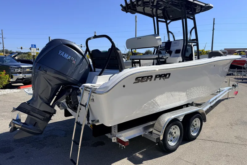 Slide: The Image of 2025 Sea Pro 225FLX Sandbar boat with Yamaha engine on trailer. - 6