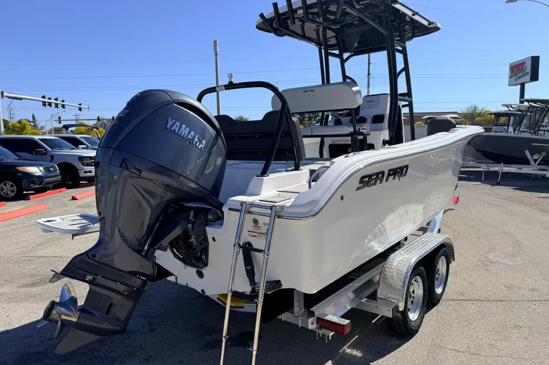 Slide: The Image of 2025 Sea Pro 225FLX Sandbar boat with Yamaha outboard motor on a trailer. - 7