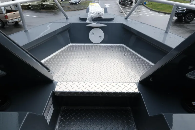 Slide: The Image of 2026 Hewescraft 270 Alaskan ET Hardtop boat deck with diamond plate flooring. - 14