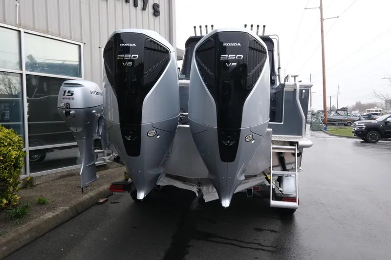 Slide: The Image of 2026 Hewescraft 270 Alaskan ET Hardtop with dual Honda 250 V6 outboard engines. - 4