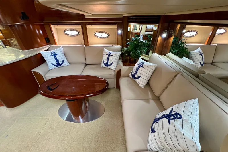 Slide: The Image of Luxurious 2005 Sea Ray 500 Sundancer yacht interior with elegant seating and nautical decor. - 15